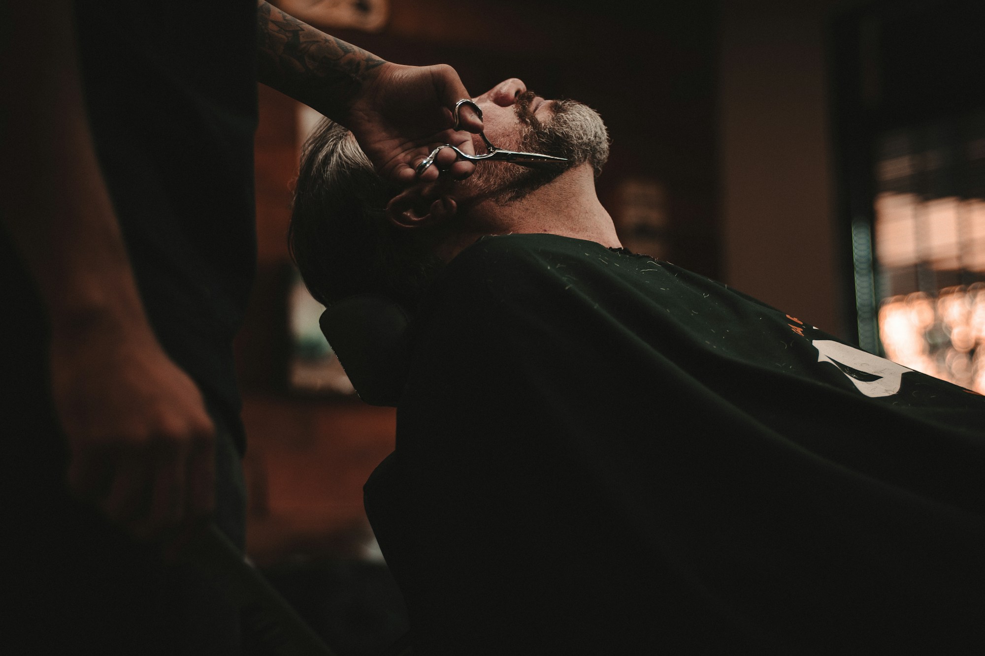 Barber at work in a modern barbershop